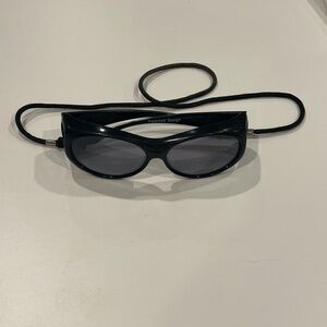 Johnathan Paul Black Sunglasses outdoor with chum Strap